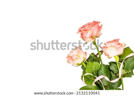 Bouquet of fresh delicate roses isolated on white background. Romantic gift concept, pink flowers. Mothers, Valentines, or Woman Day. Mockup, template, greeting card, flat lay, top view