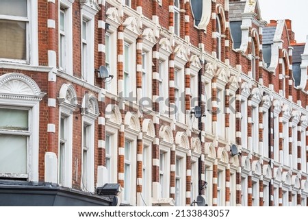 Facade of traditional English terraced houses on Muswell Hill in North London