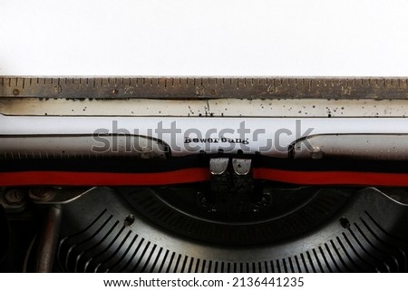The German word Bewerbung written in red on an old mechanical typewriter German Text: Application