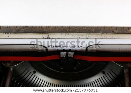 The German word Zwischenzeugnis written on an old mechanical typewriter German Text: Between testimony