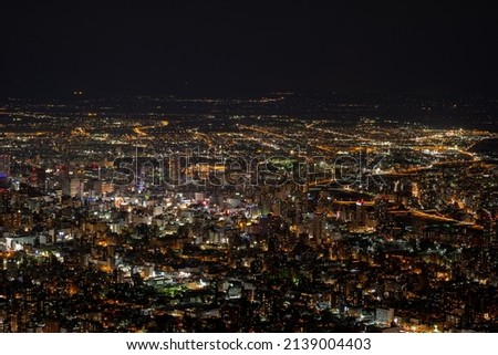 Top view of Downtown Sapporo, Japan skyline in Winter and Dark Sky