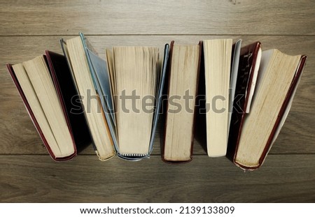 Old books collection on wooden table