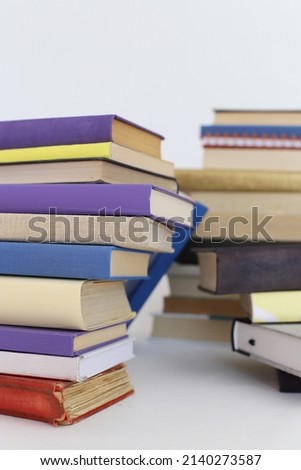 Stacks of books for reading, pile of textbooks for education
