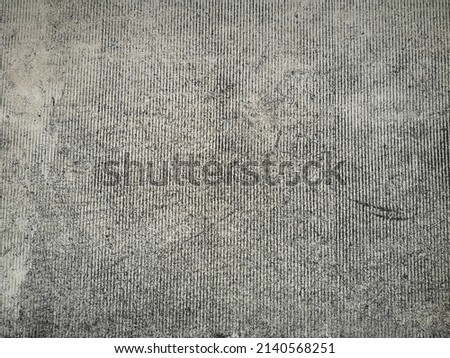 Grunge​ cement​ wall​ or​ floor​ texture​ and​ background​