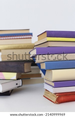 Stacks of books for reading, pile of textbooks for education
