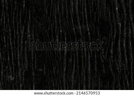Rough textured dark bark surface for abstract background