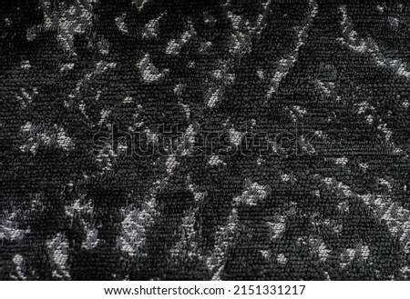 dark gray background with abstract pattern.  texture of  loop fabric.