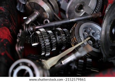 Motorcycle engine spare parts in dismantling assembly.