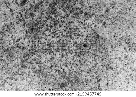 Dark gray rough textured old iron metal plate with heavy grunge texture