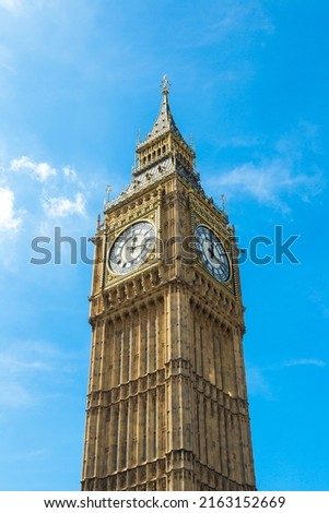 Close up of Big Ben clock tower against cloudy sky in London in a beautiful summer day, England, United Kingdom
