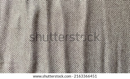 wrinkled texture of gray bedding