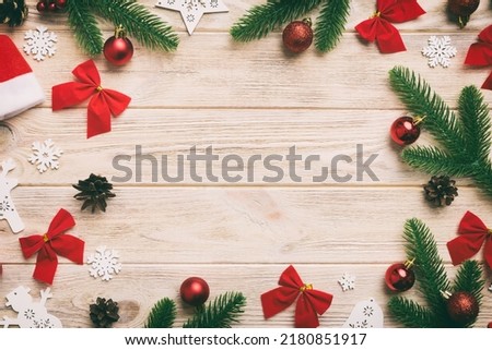 Christmas background with fir branches and Christmas decor. Top view, copy space for text.