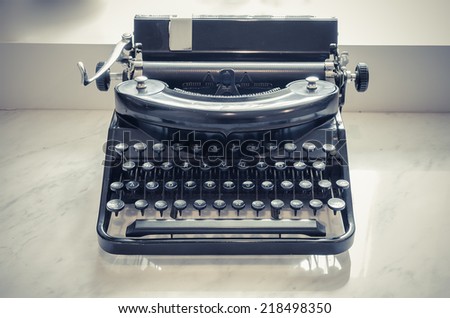 retro photo of old typewriter on table