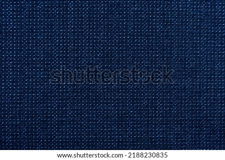 The texture is blue. Background of red material for tailoring