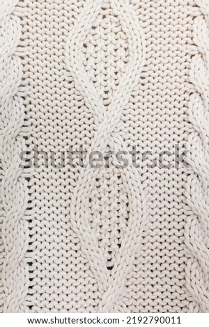Knitted sweater close-up, fabric texture