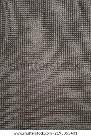 Background of grey checkered patterns of textile