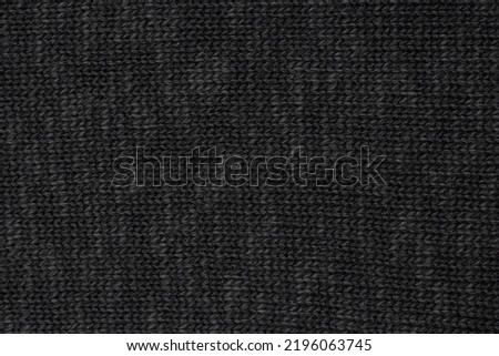 Close-up image of knitted clothing fabric tissue.