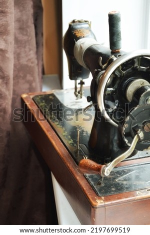 an old sewing machine. antiques, an old item. background for the design.