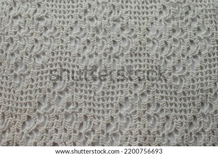 A knitted striped texture crocheted.