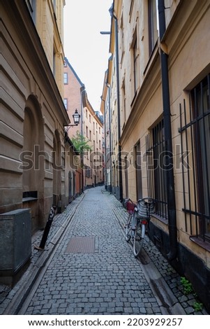 street with old houses in the center of the old city in the street of Stockholm Sweden