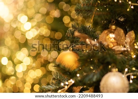 christmas tree background,atmospheric bokeh lights with balls and christmas tree decorations