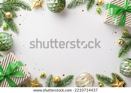 Christmas Eve concept. Top view photo of gift boxes pine branches in hoarfrost with gold green transparent baubles star ornaments and confetti on isolated white background with copyspace in the middle