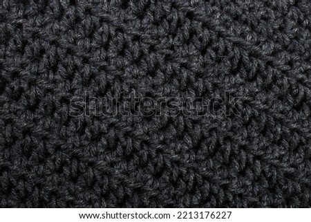 Hand made crochet pattern, textured abstract background, knitted threads texture close up