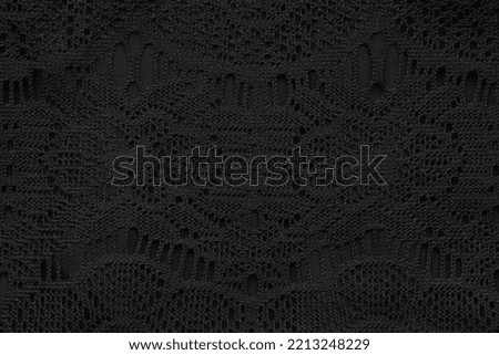 Close-up abstract texture black color fabric cloth textile background, cotton material, soft folds waves on the fabric. Macro, web theme, template, wallpaper, concept design, for your design