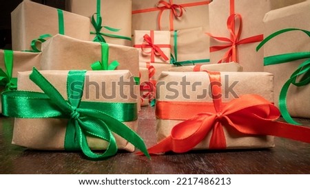 Closeup of presents for Christmas Eve. Christmas gifts on stock.