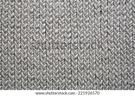 Grey knitting mat background
