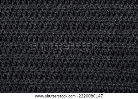 Hand made crochet pattern, textured abstract background, with horizontal lines, knitted threads texture close up