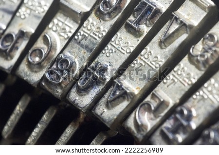 close up of old vintage typewriter keys for various concepts.