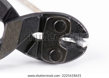 No focus. Wire cutters close-up. Isolate of a working tool on a white background.