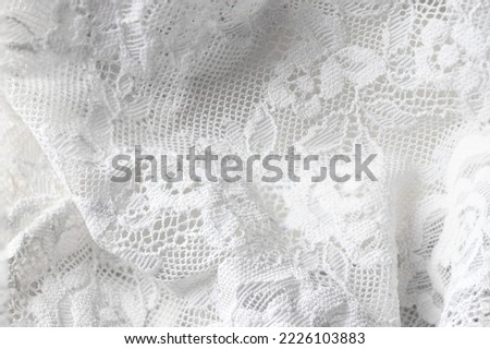 White lace fabric texture for wedding background.