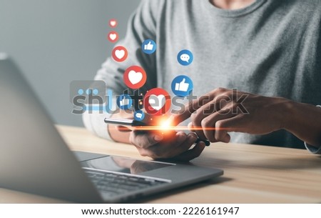 Man using smart phone with Social media. The concept of living on vacation and playing social media. Social media and digital online concept, Social Distancing, Working From Home concept.