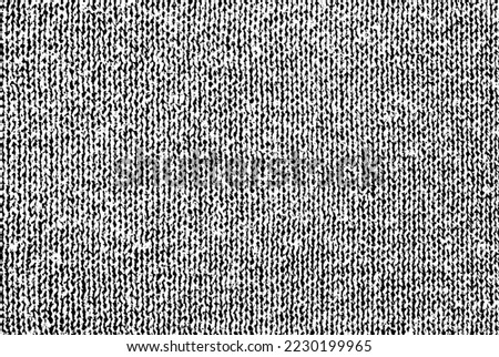 Abstract grunge overlay texture of a knitted fabric surface