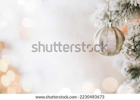 Blurred Christmas background with Christmas tree branch, close up