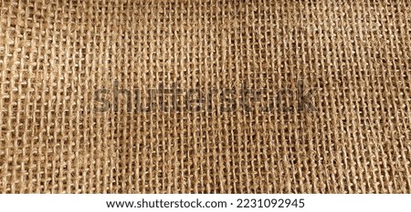 Brown natural fabric. Burlap fabric close up. Texture of brown fabric. burlap texture. Network texture.