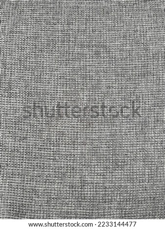 gray canvas texture, fabric background. seamless texture of gray dots, lines, pixels on black background. Black inversion of free structures
