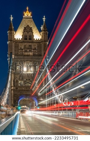 London, UK-08-27-2022: Light trails on Tower Bridge in London at blue hour
