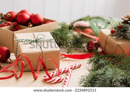 Gifts in craft paper with ribbons and bows for new year or Christmas. Preparation for the holiday