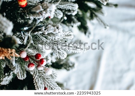 New Year festive banner. Christmas decorations on the christmas tree close up. Decorated Christmas background. Merry christmas and New Year concept.
