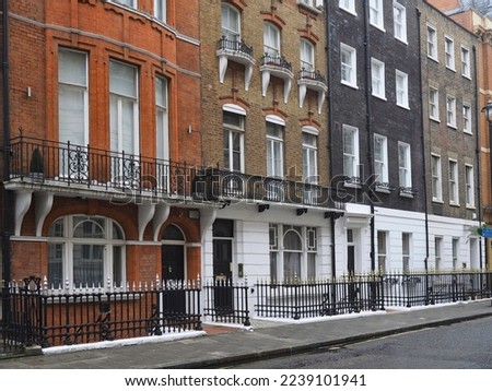 Residential street in Marylebone,  with small old apartment buildings and townhouses