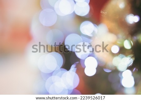 Abstract bokeh lights. Bokeh blur of lights at night. Bright blue, gold, white glow circle background for festive, Christmas, and new year. with copy 