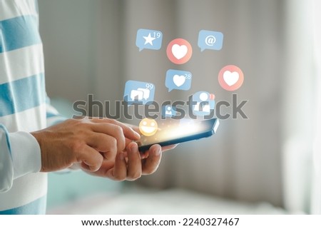 Young man using smart phone, Social media concept. smartphone and show technology icon social media..