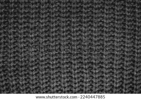Organic knitted material with macro wool threads.