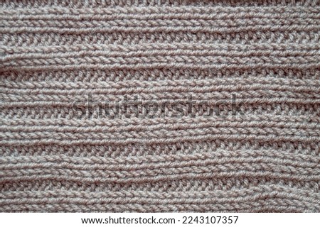 Handmade knitted texture with detail weave threads.