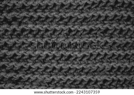 Handmade knitted background with macro woven threads.