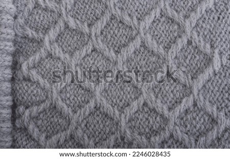 gray background from knitted texture macro