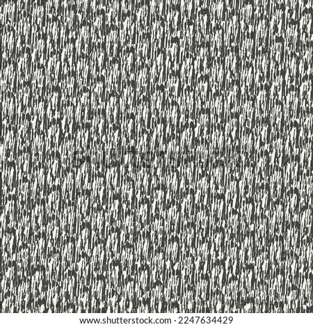 A fragment of a thick fabric, woven from wool or jute, in black and white. Used carpet with a scales pattern. Rough texture background. 